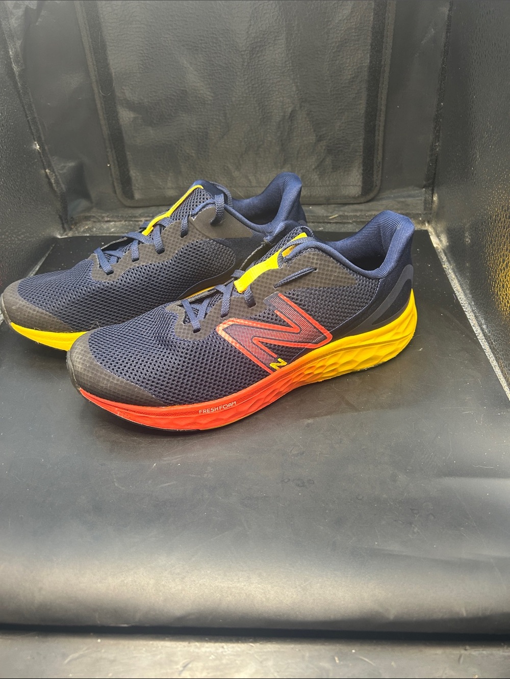 New Balance Men’s Navy Athletic Shoes with Red and Yellow Soles